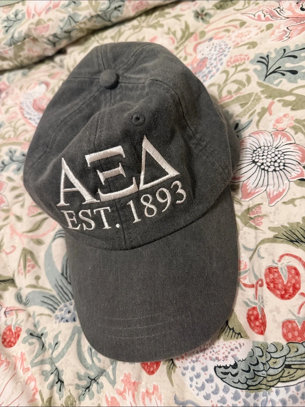 Gray Baseball Cap with White Embroidered Letters Alpha Xi Delta